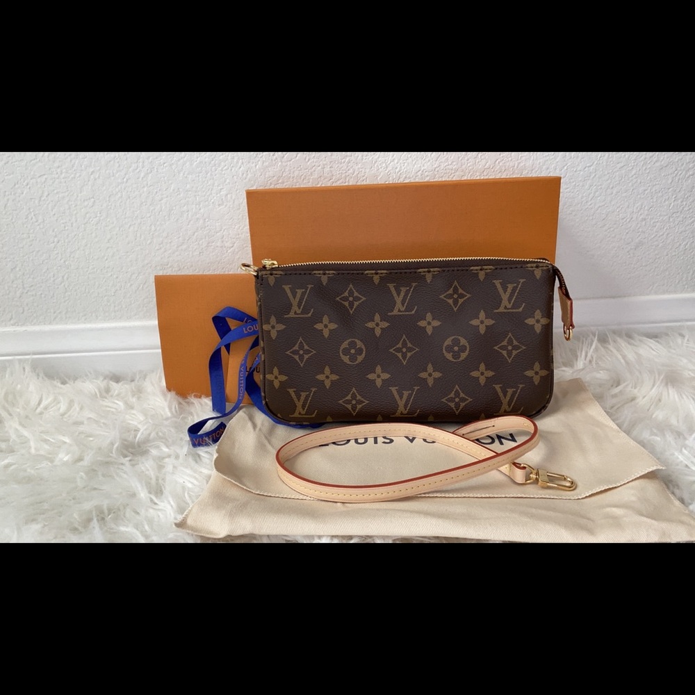 SOLD Pochette Accessories in monogram